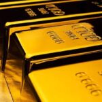 Goldman Sachs Slashes Year-End Gold Target by $500 Amid Rate Cut Doubts